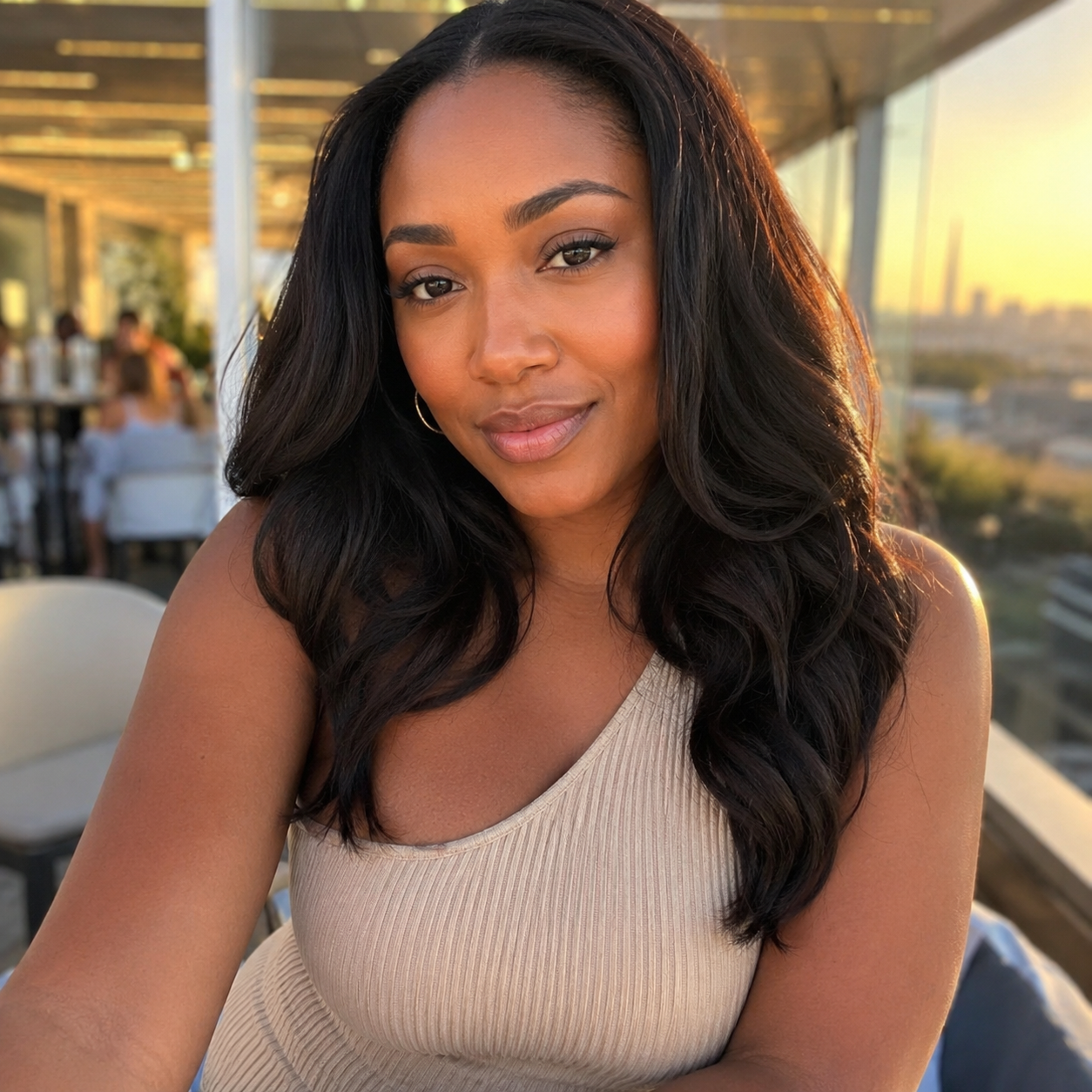 Smiling woman on a sunlit terrace
